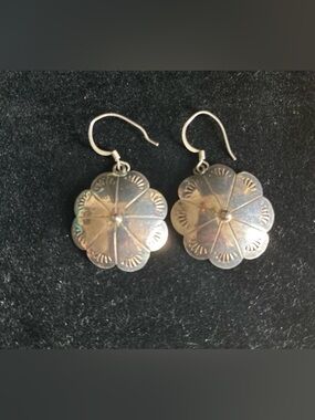 Handmade Navajo concho earrings crafted from sterling silver Stamped JS